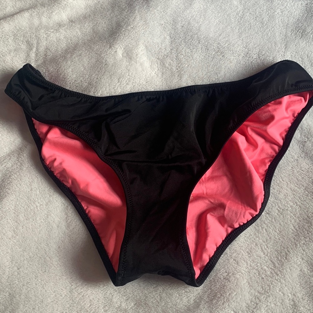 Pink bikini bottom black with pink lining and “scrunch” butt size large